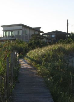 A picture of houses in the morning sun.