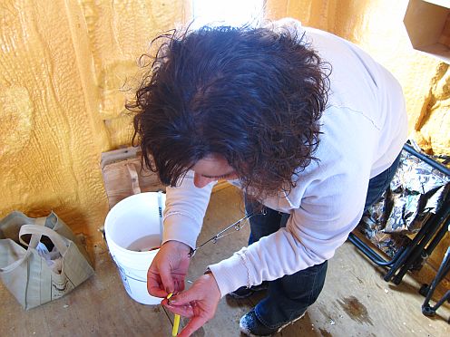 Woman baiting a fish hook