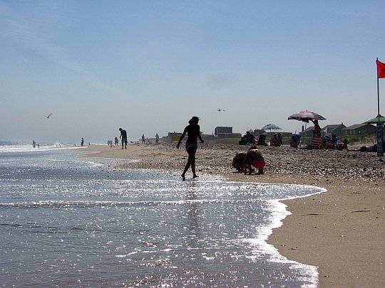 A girl walking on the beach