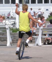 A man riding a unicycle