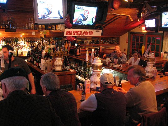 Men sitting at a bar