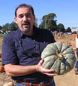 me holding a green pumpkin