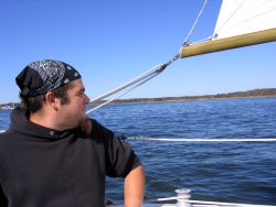 A man in a sailboat