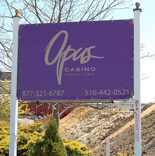 A sign post for Opus casino cruise lines.