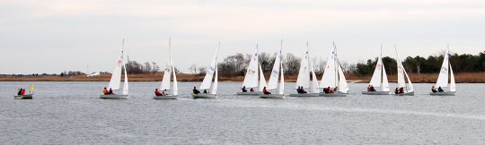 small sailboats at the starting line