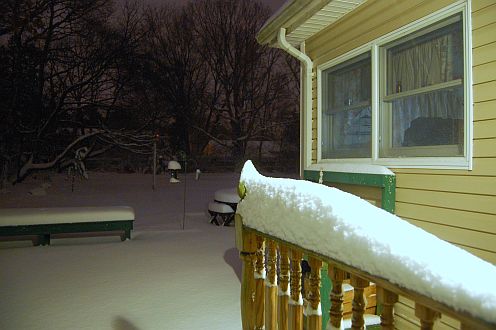 snow covered handrail