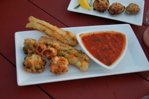 fried vegetables and baked clams