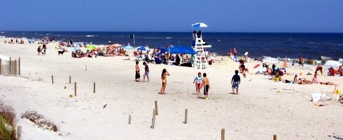 A beach with life guard stand