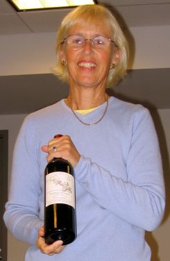 Lousia Hargrave with a bottle of her 1980 Cabernet